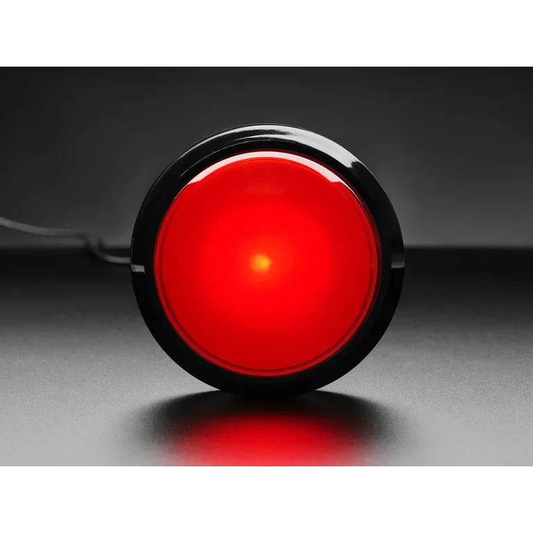 검은 테두리 안에서 붉게 점등된 대형 돔형 LED 터치 버튼